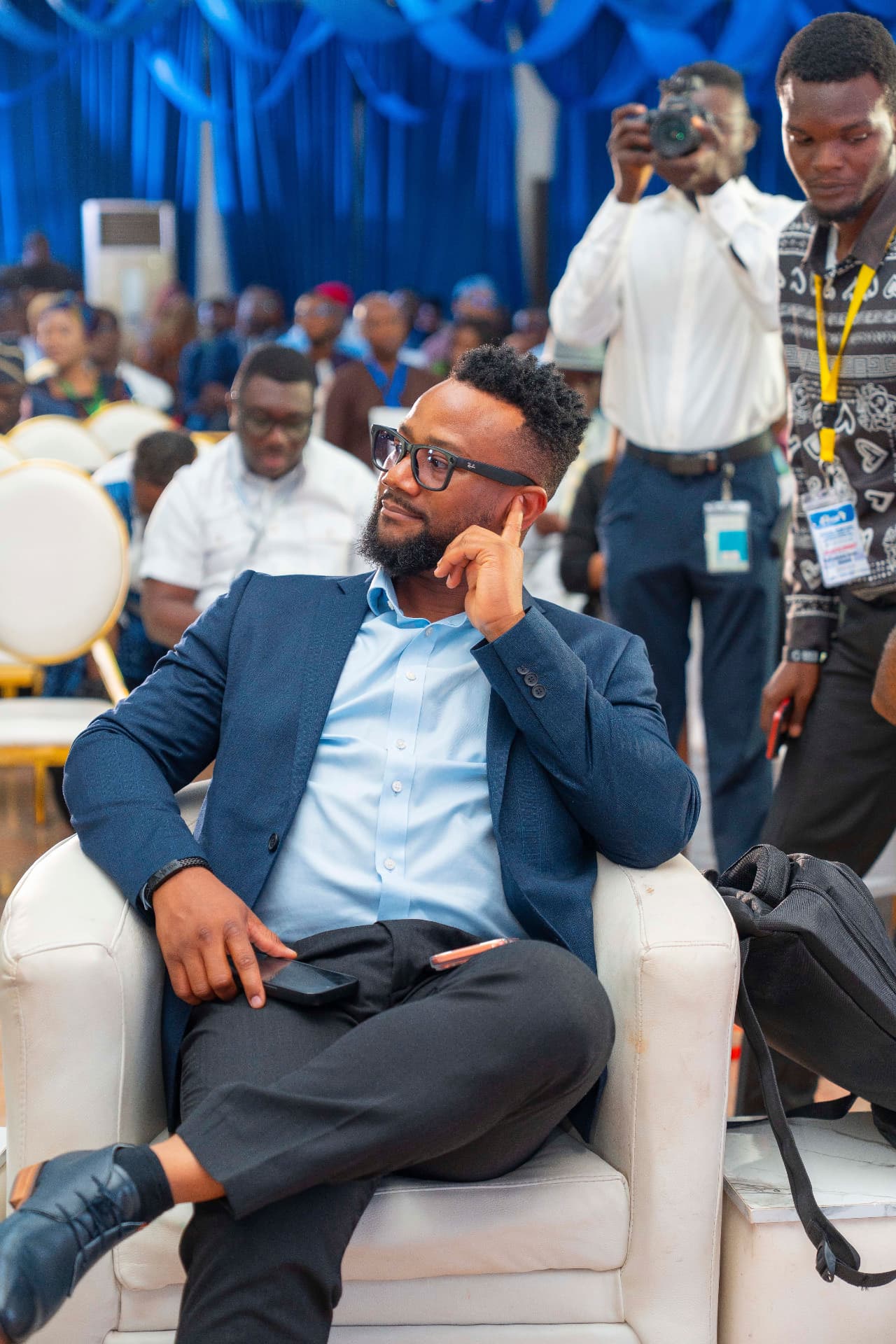 Dr JohnPaul Odigbo seated among delegates at the AFCO/NOA conference in Abuja