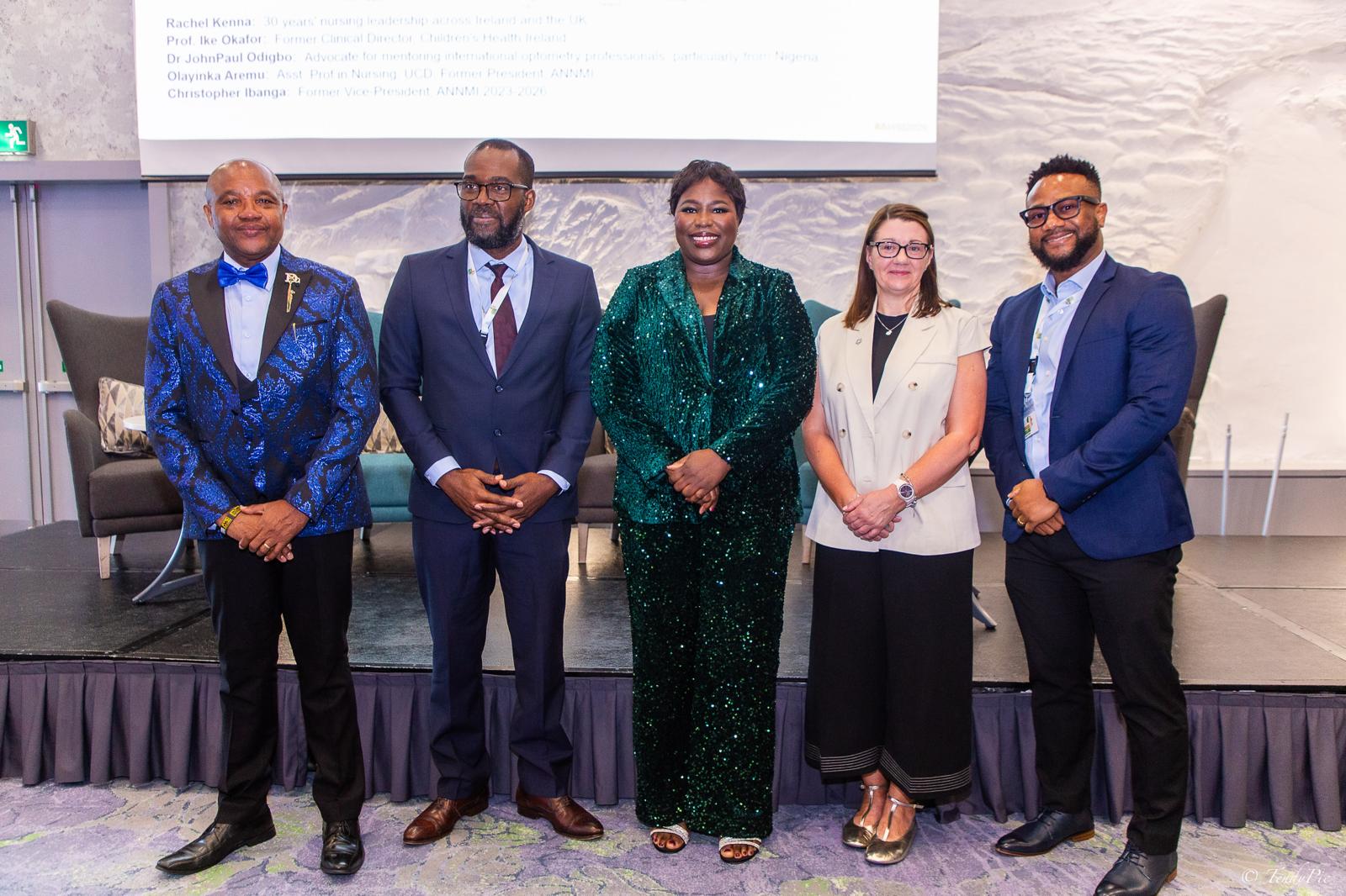John Paul Odigbo with fellow plenary speakers on stage at the African Health Summit Ireland
